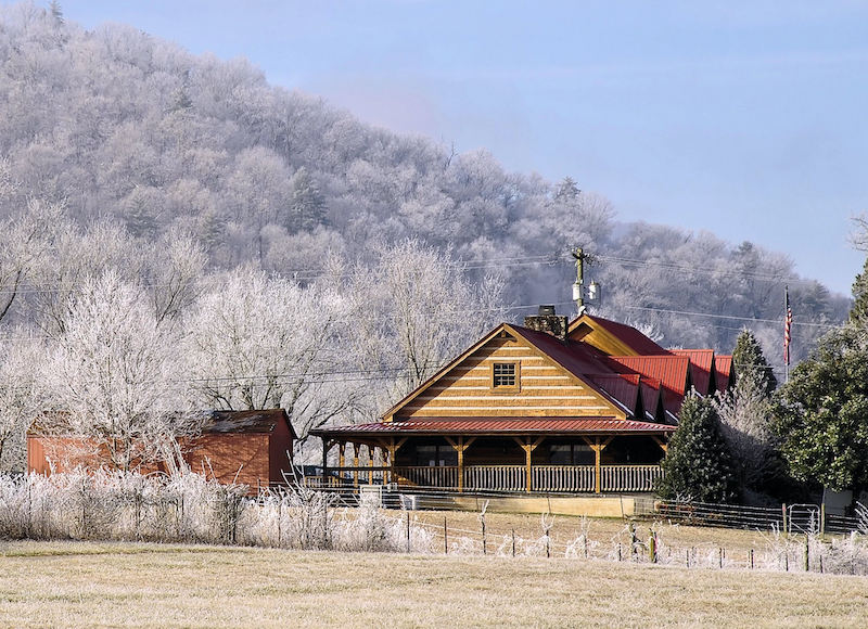 shutterstock_47994205 – winter smoky mountain house scene – CROPPED